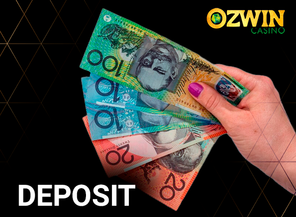 Hand holding Australian dollars and Ozwin Casino logo