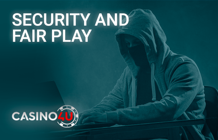 A masked man completely anonymous at a laptop computer and Casino4u logo