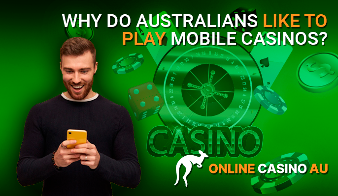 Widely smiling man with a phone in his hands plays online mobile casino