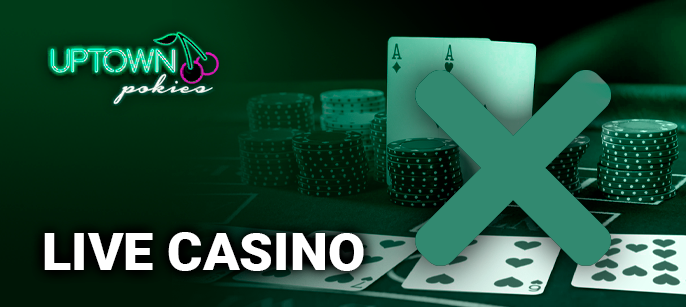 Gambling table with playing cards and chips and Uptown Pokies Casino logo with cancellation icon